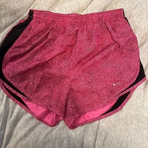 Pink and black speckled Nike shorts